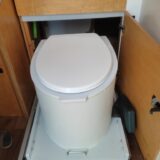 Australia: our newly built composting toilet turned out quite well. Here it's in place in our habitation box on "Bert".